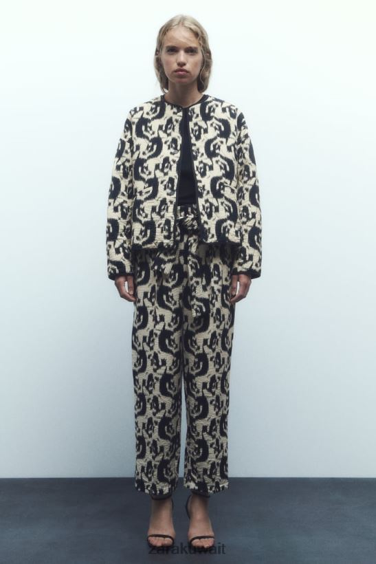 Zara سترة منتفخة بطبعات الحيوانات نحيف بيج فاتح/أسود ملابس 6L6LL8107